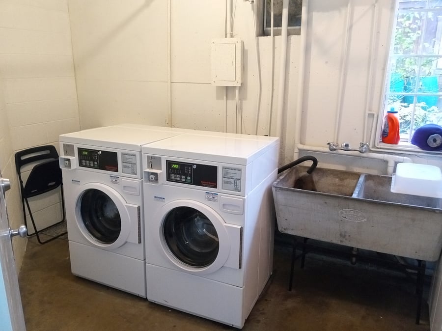 Coin operated laundry in garage