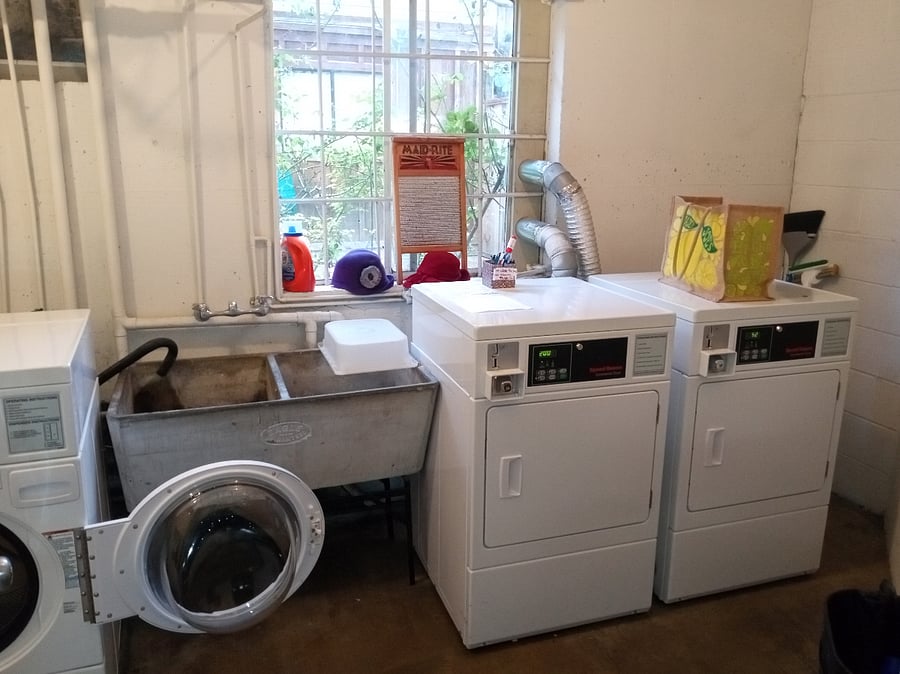Coin operated laundry in garage