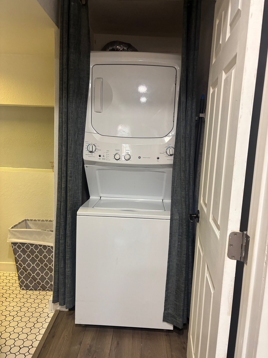 Washer and dryer in apartment.