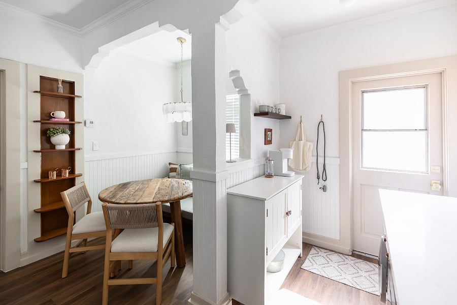 view of dining nook, coffee corner, and door to backyard