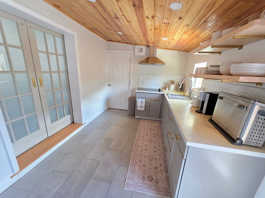 Kitchen can be closed off from both bedrooms