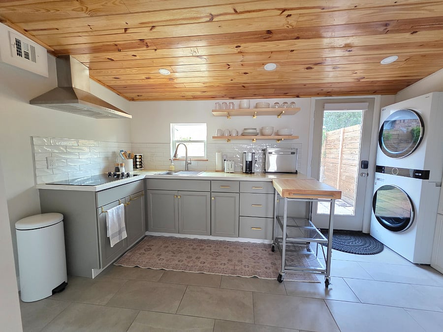 Kitchen Island Cart with Wheels adds multi location prep space and holds up to 100 lbs. Bulk beverage packs are like a feather on this.