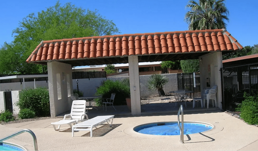 Shaded area and a hot tub at poolside