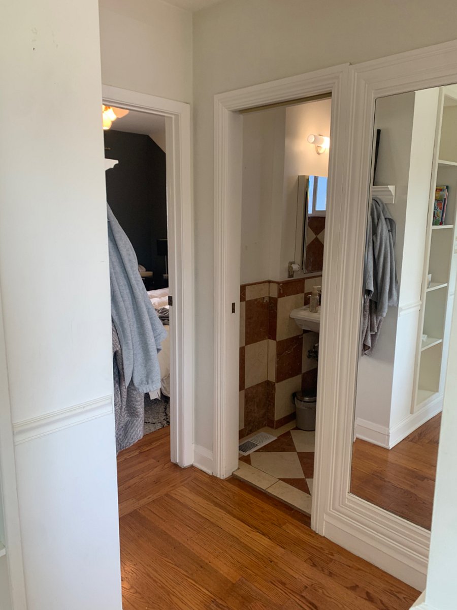 Hallway with entrance to bedroom #1 and the entrance to the full bathroom. Bedroom # 2 entrance is at the other end of the hall.