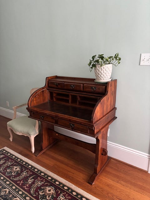 This roll-top desk is in the "sitting room/office" space.