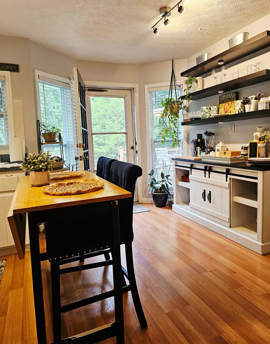 Bright, airy kitchen with direct access to the outdoor deck.