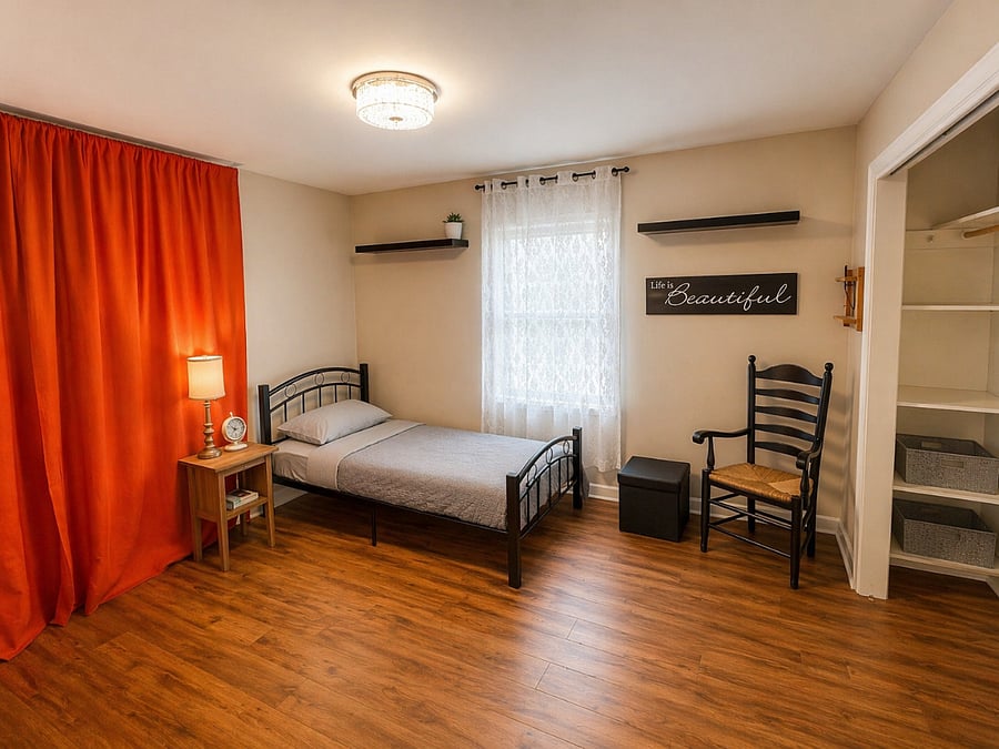 3rd cozy minimalist bedroom or use as sitting area, office or playroom for kiddos.