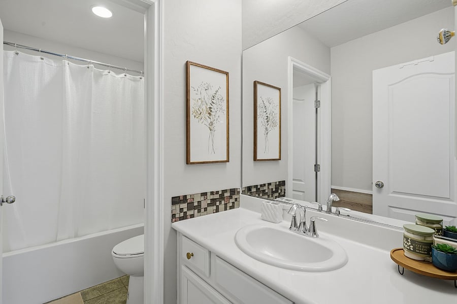 Bathroom 2 with shower tub and vanity