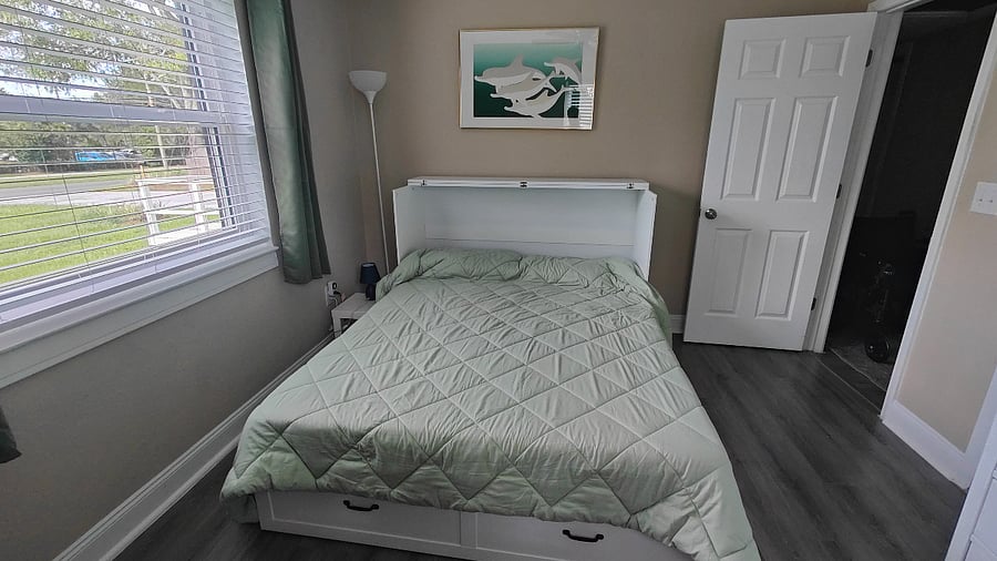 Second bedroom/office with queen Murphy bed unfolded.