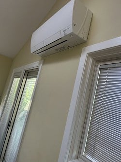 Mitsubishi split system in each room controlled by tenant.