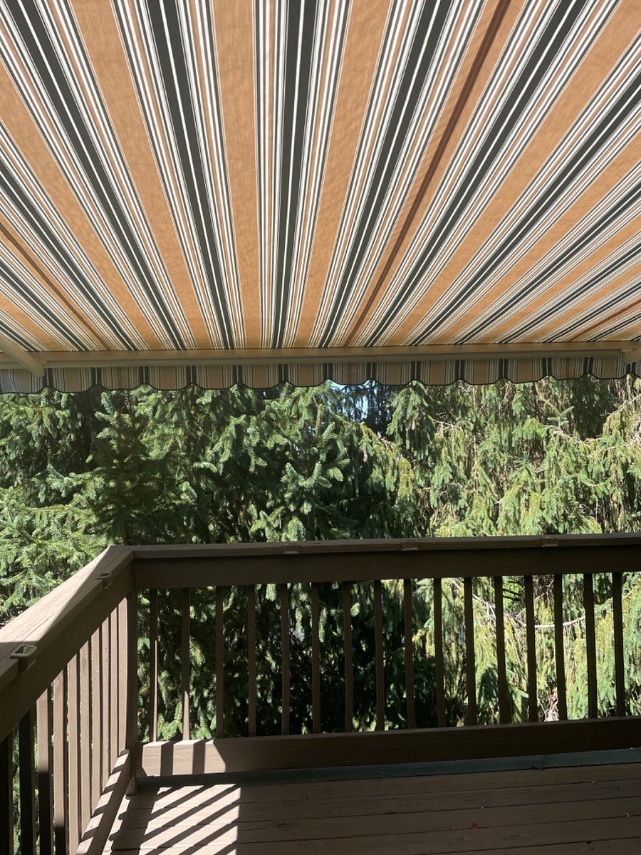 Deck area, entrance from the living room, main level. 