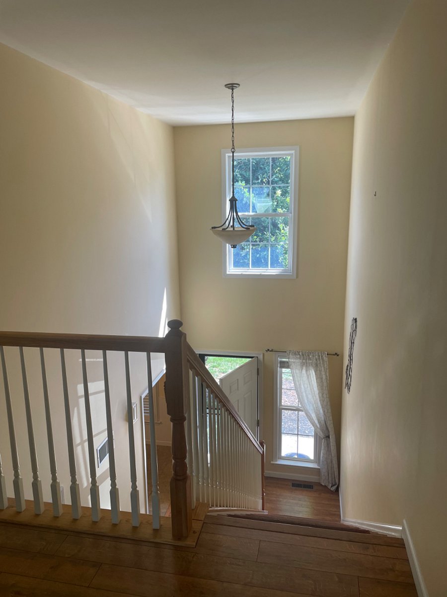 Stairs from the 2nd floor to the main entrance 