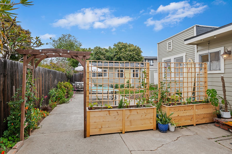 Walk through this vined trellis to your cottage. 