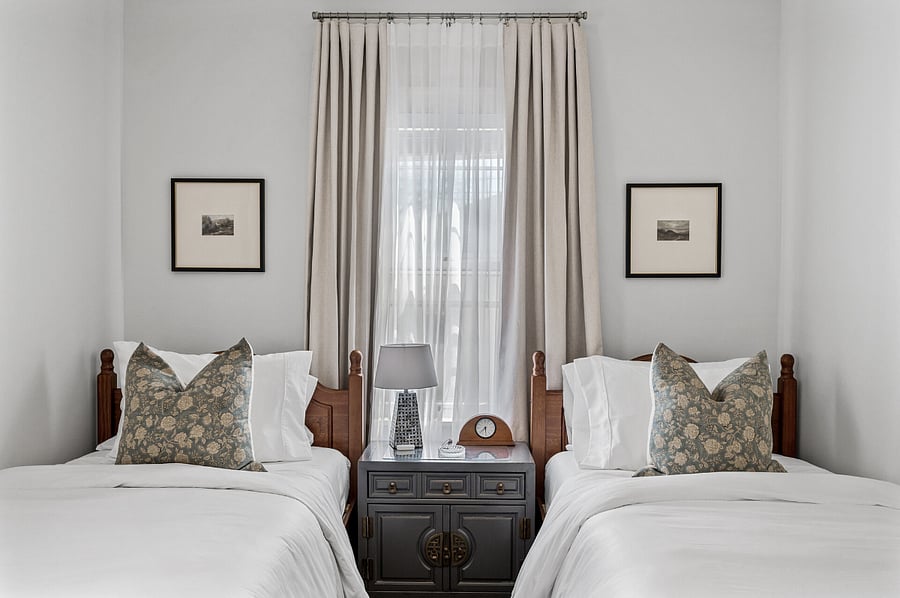 Drift off in comfort in our twin beds, with blackout curtains to keep the morning light at bay for a peaceful night's sleep.