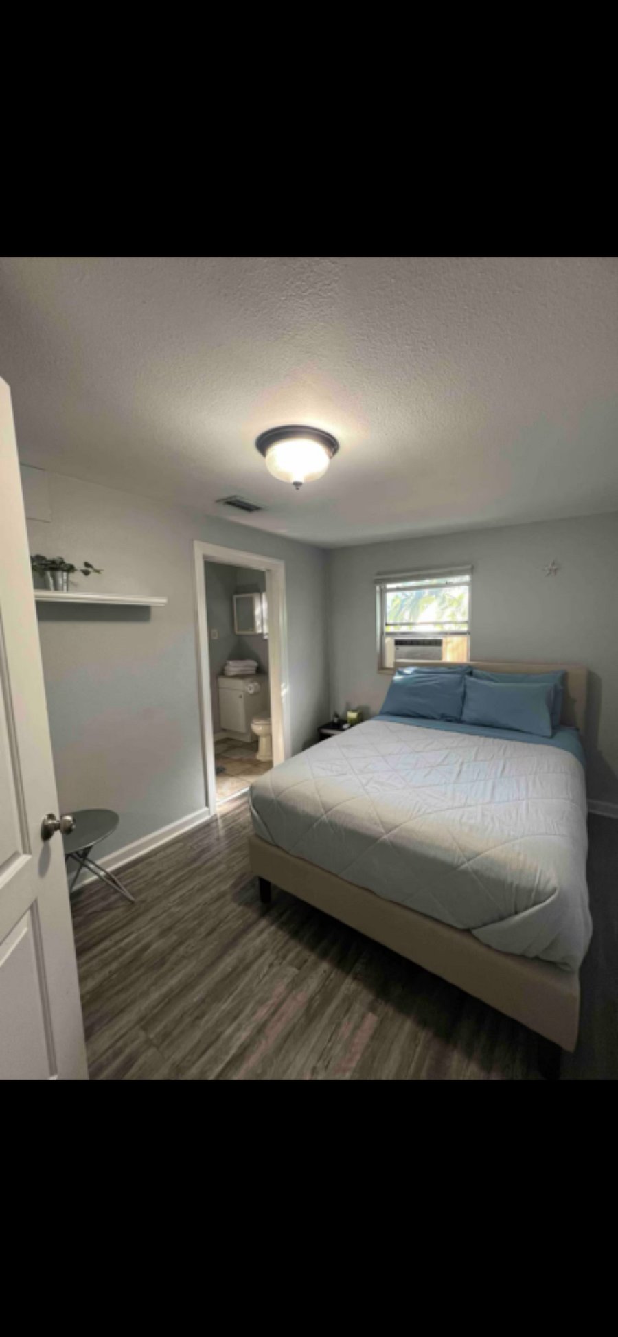 3rd bedroom offers a comfortable double size bed with private bathroom attached.