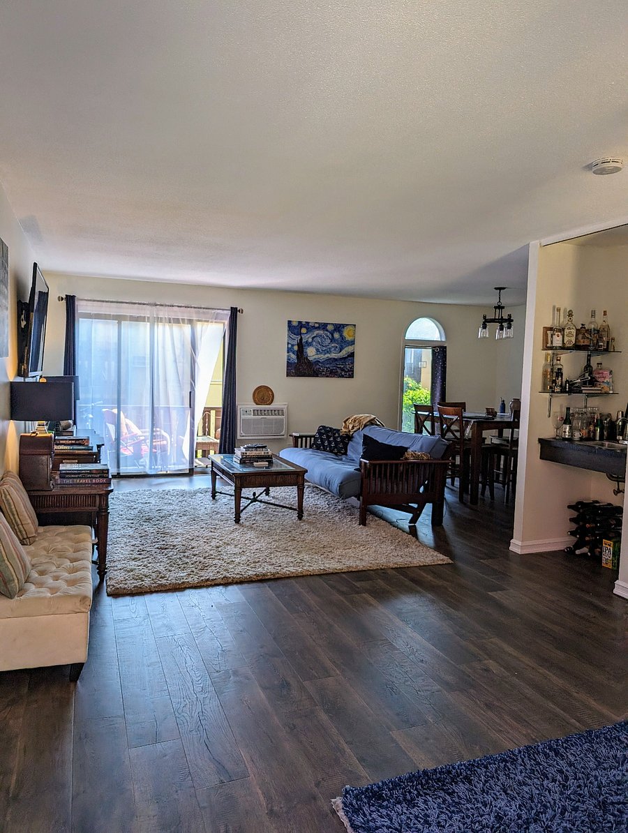 Living room, entry view (shared space)