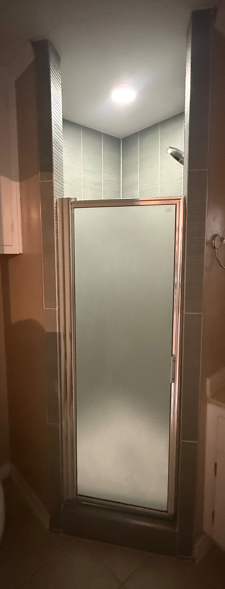 The new shower, we improved the ventilation, new tile, and added new fixtures.