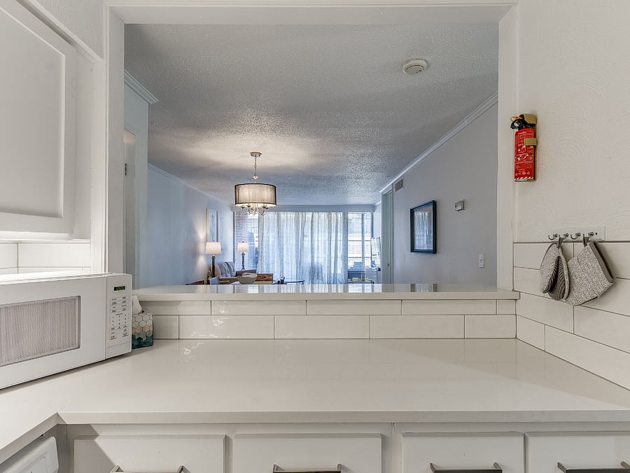 KITCHEN LOOKING TOWARD BAR