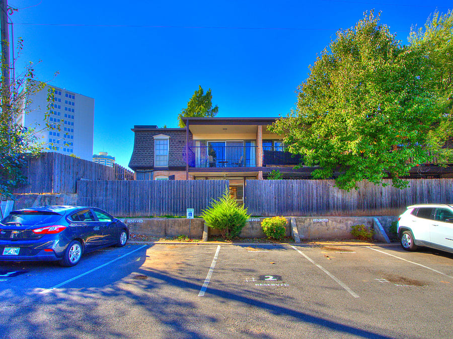 Rear entry into condo with walk-through gate.