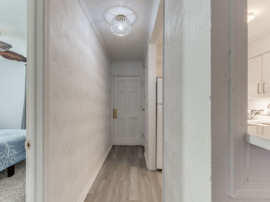 ENTRY HALL GOING OUT BY KITCHEN AND TAIPEI SUITE