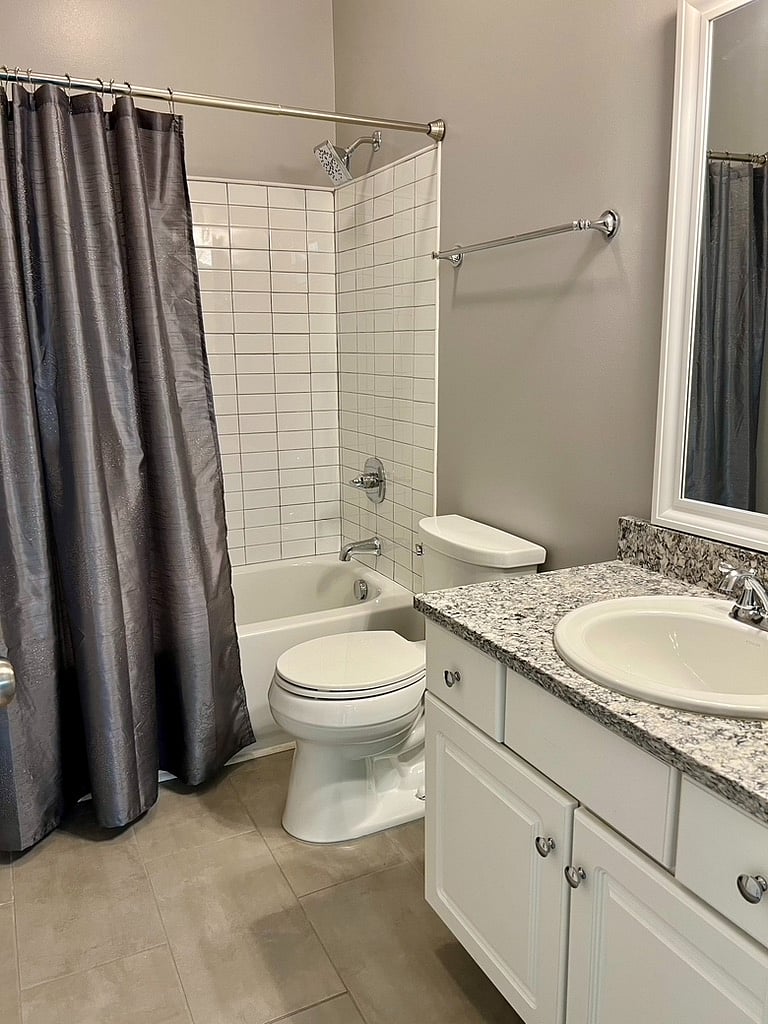 Second full bath attached to second bedroom and livingroom.