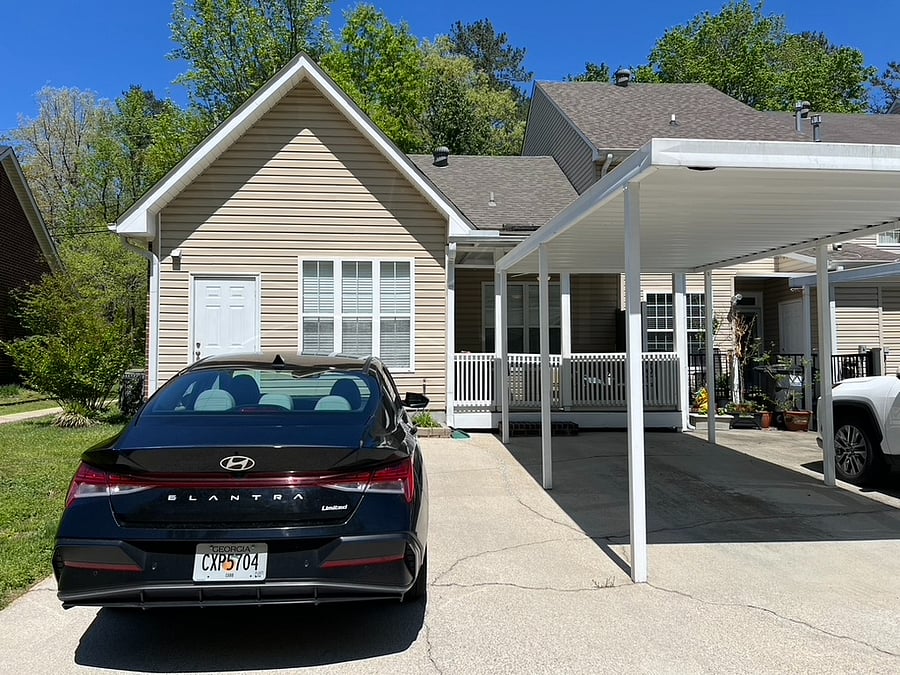 Private parking for 2 cars. 1 covered, 1 uncovered.