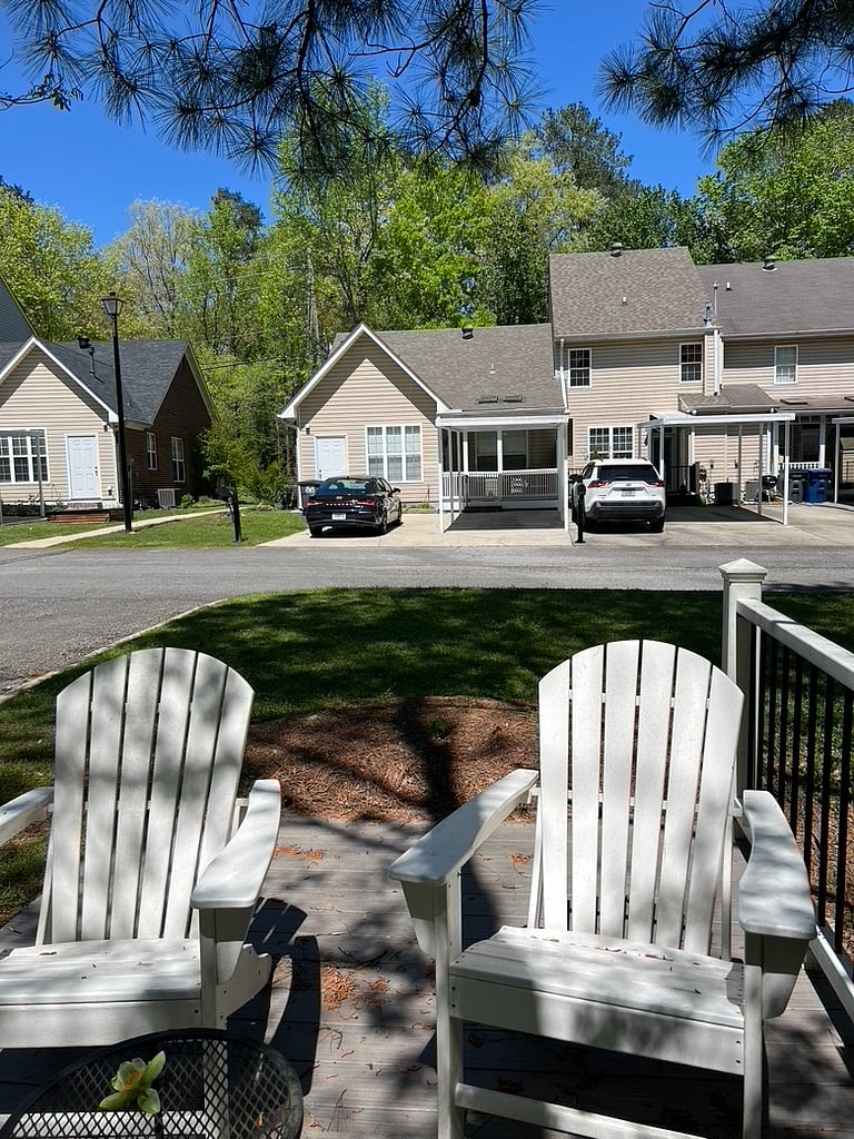 Only a few steps away from the townhouse, shaded by hardwood trees.