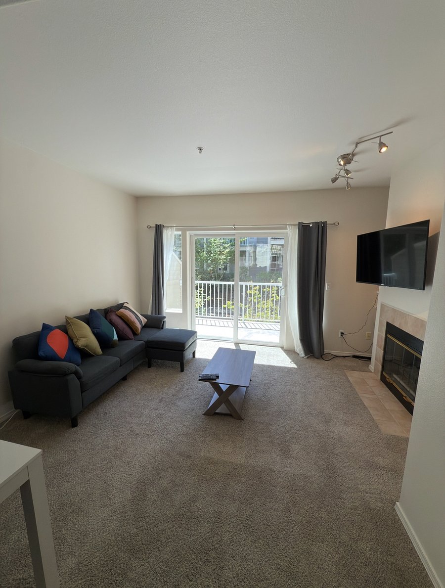 Living Room with 55'' TV and gas fireplace
