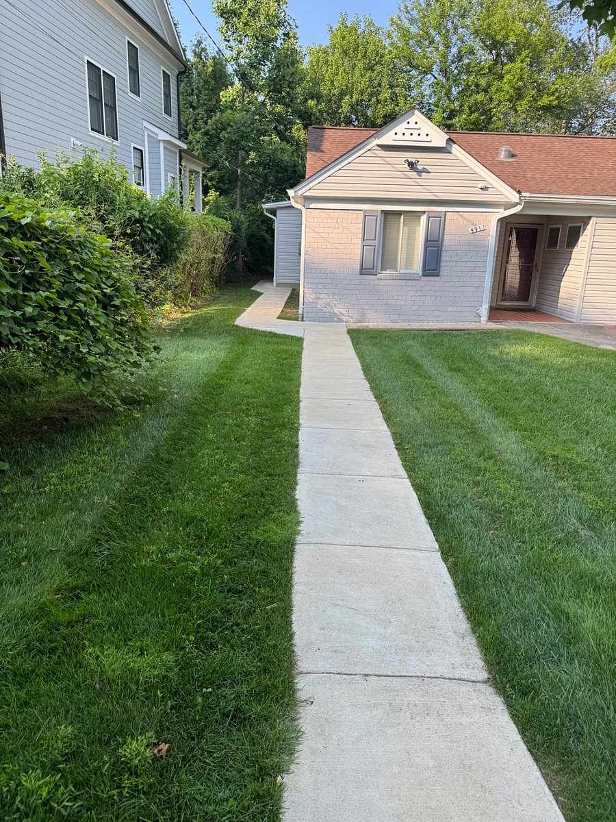 Sidewalk takes you to the apartment in the back of the house