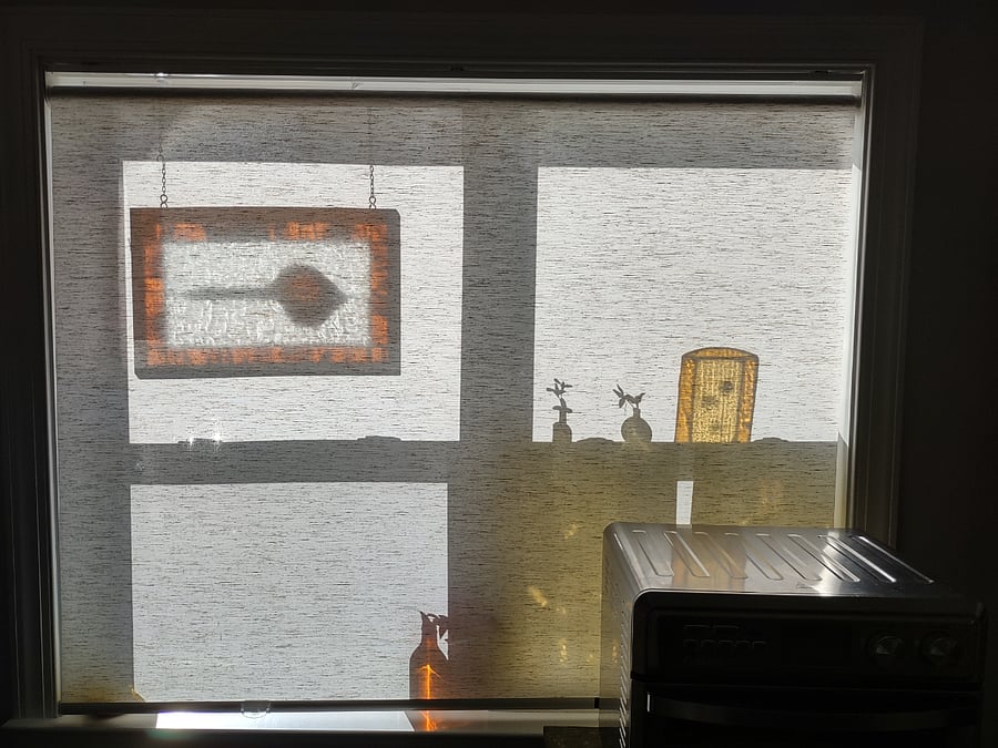 Afternoon sun coming through stained glass.