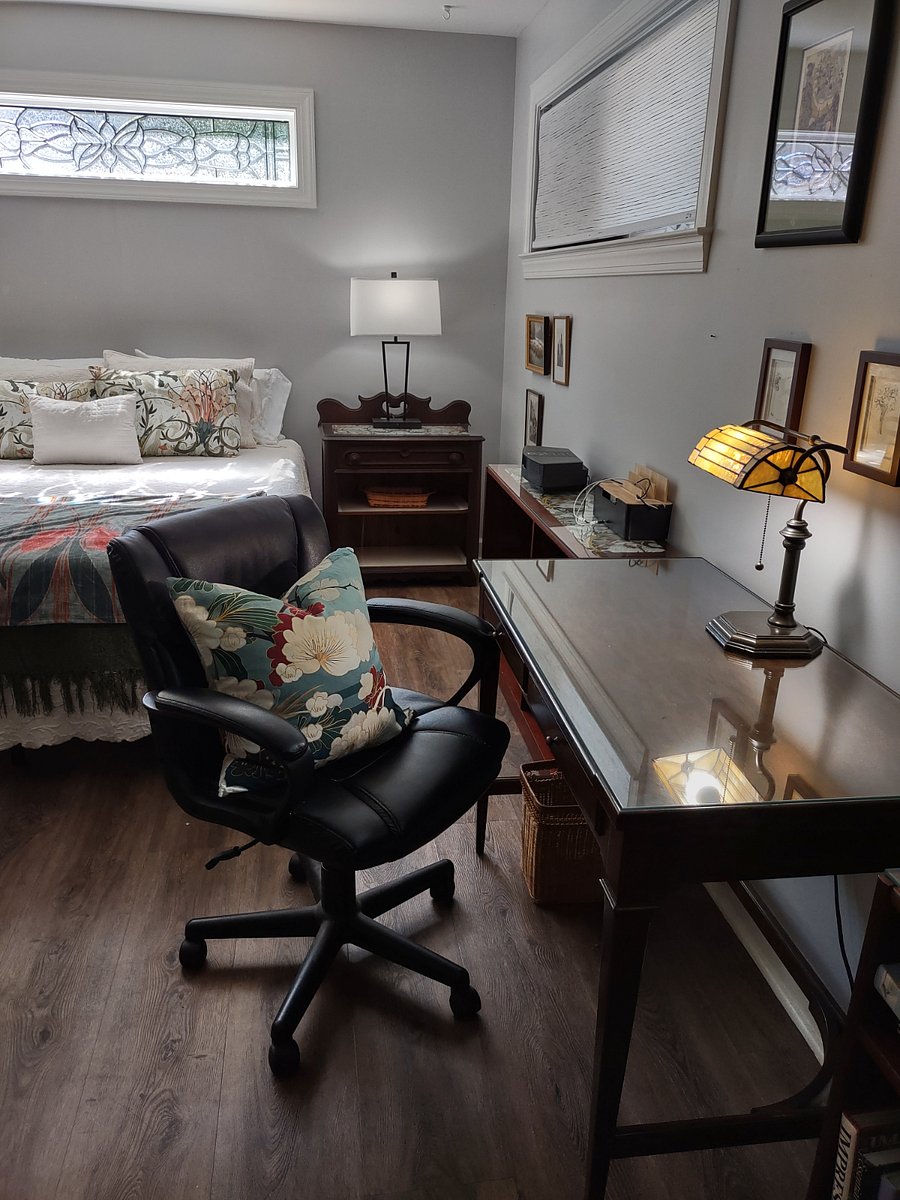Custom glass top tables, bookcases & desk. Easy to clean! Bose radio & charging station.