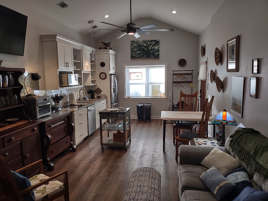 Granite top, movable kitchen prep island.