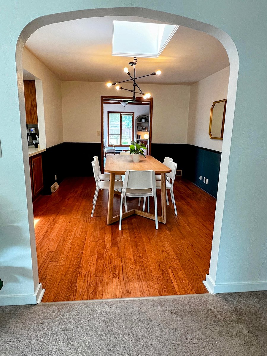 The dining room comfortably seats six and open into the kitchen, study, and living room.