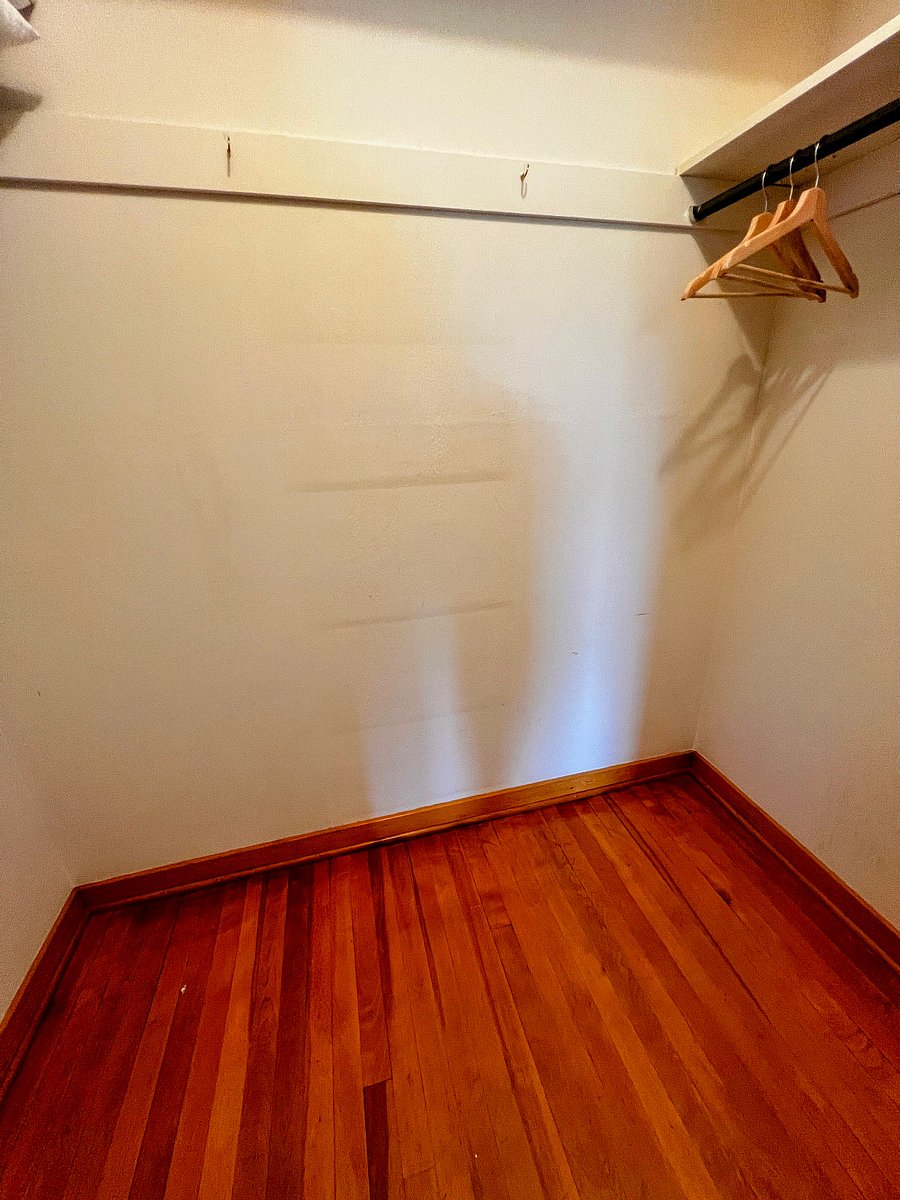 The front bedroom has lots of storage and hanging space.