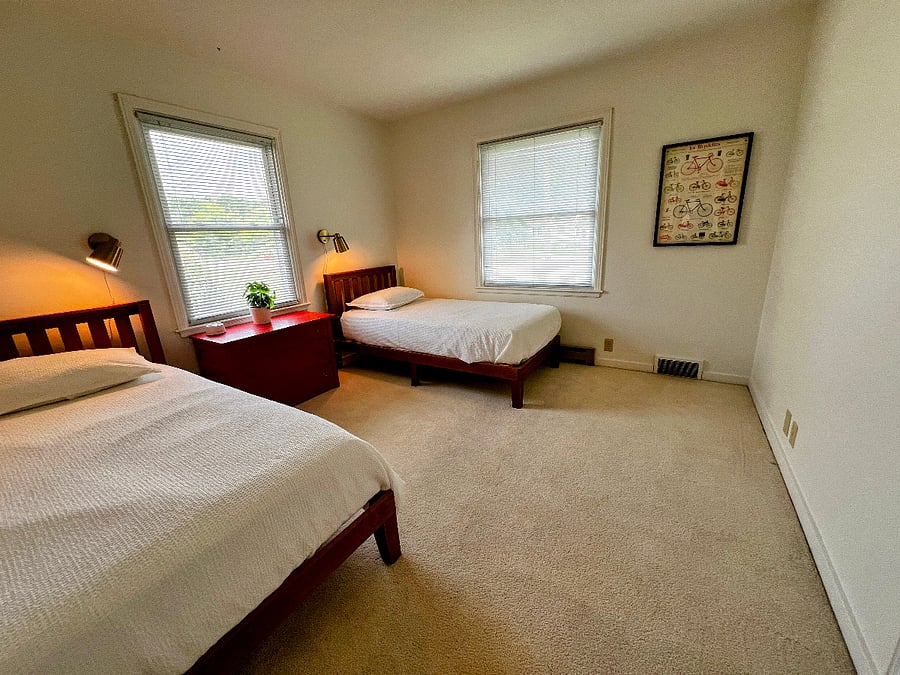The front bedroom has two twin beds and a closet with lots of storage space.