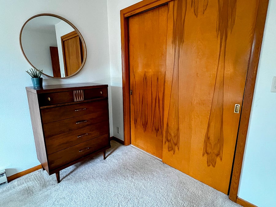 Plenty of storage is available in the dresser and closet. 