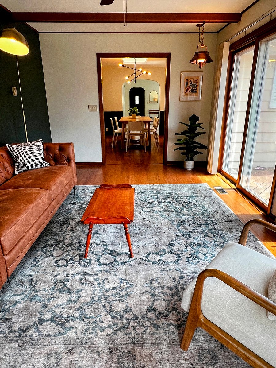 A sliding glass door opens from the study onto the back deck.