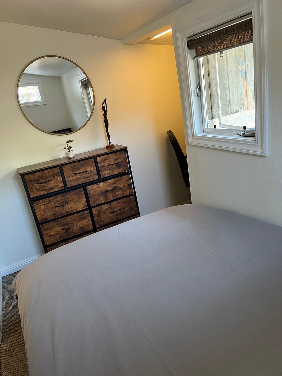 Another view of the bedroom from the double bed. Dresser and small office space. 