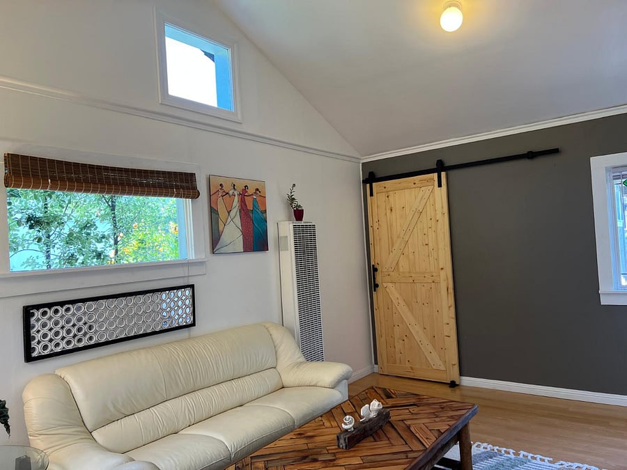 Beautiful, comfortable front room with high ceilings.