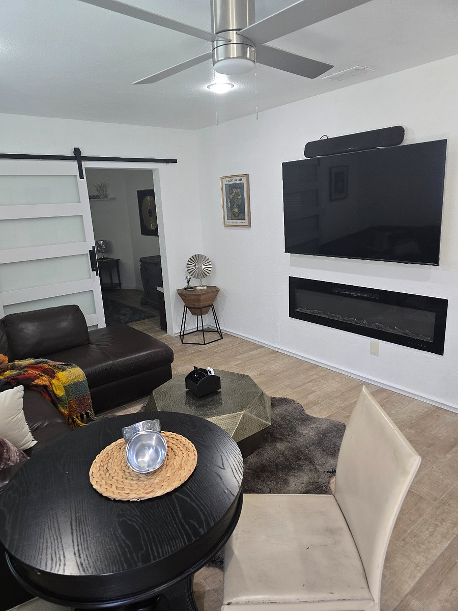 In wall 65 inch tv, soundbar and electric fireplace. 