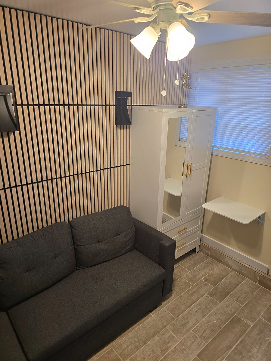 Laundry closet for your extra storage needs with full size sofa bed in bonus room.