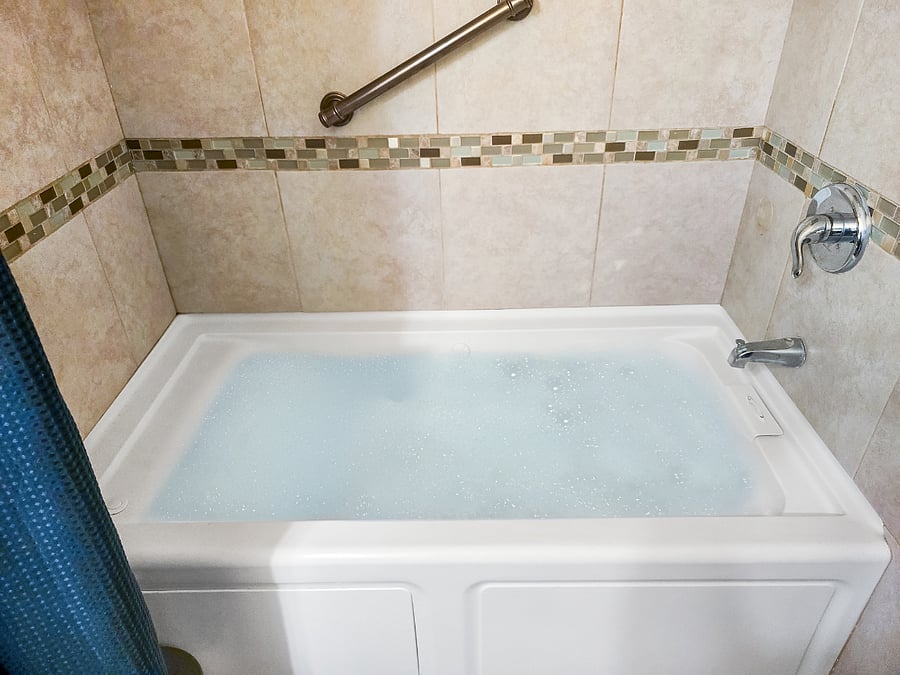 Relax at the end of each day with a bubble bath with a hot tub bathtub. 