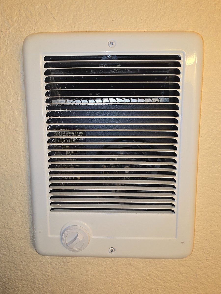 The wall-mounted electric fan heater provides plenty of heat in the bathroom when getting out of the hot tub bathtub or shower. 