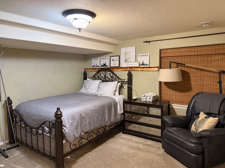 This is the primary bedroom "The Master" with a queen sized bed and direct bathroom access.