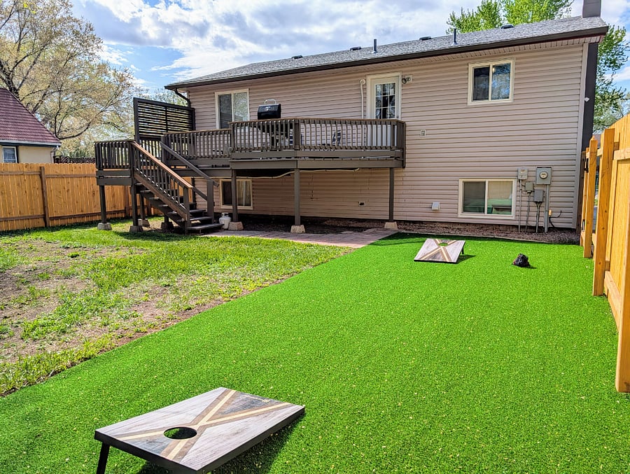 Fully fenced in back yard and deck.