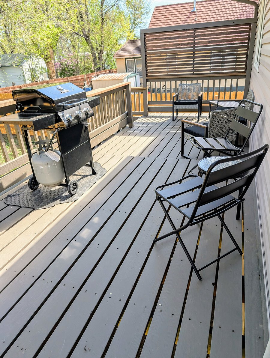Deck is accessed through the kitchen's back door.