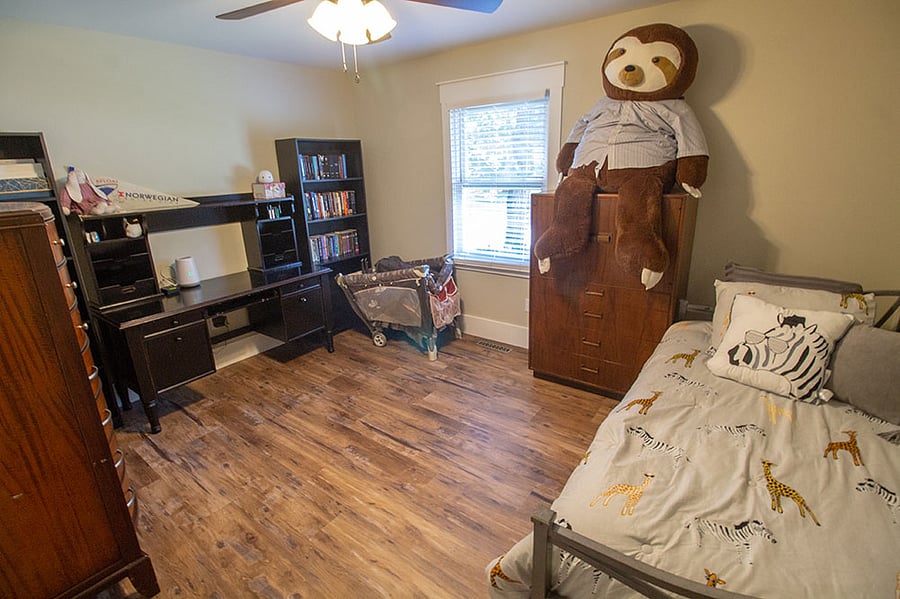 Across the hall from the primary is a twin bed and office combo.
