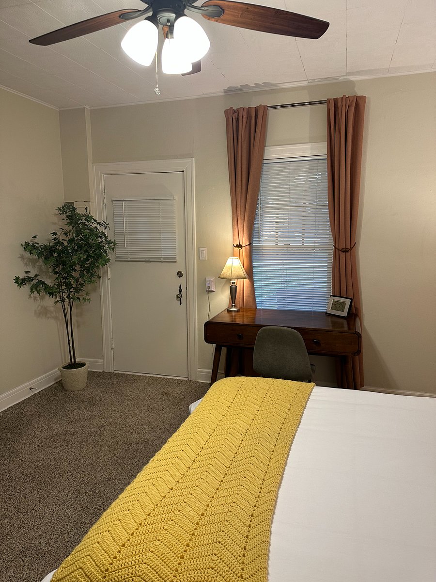 Front bedroom has a private work space, queen size bed