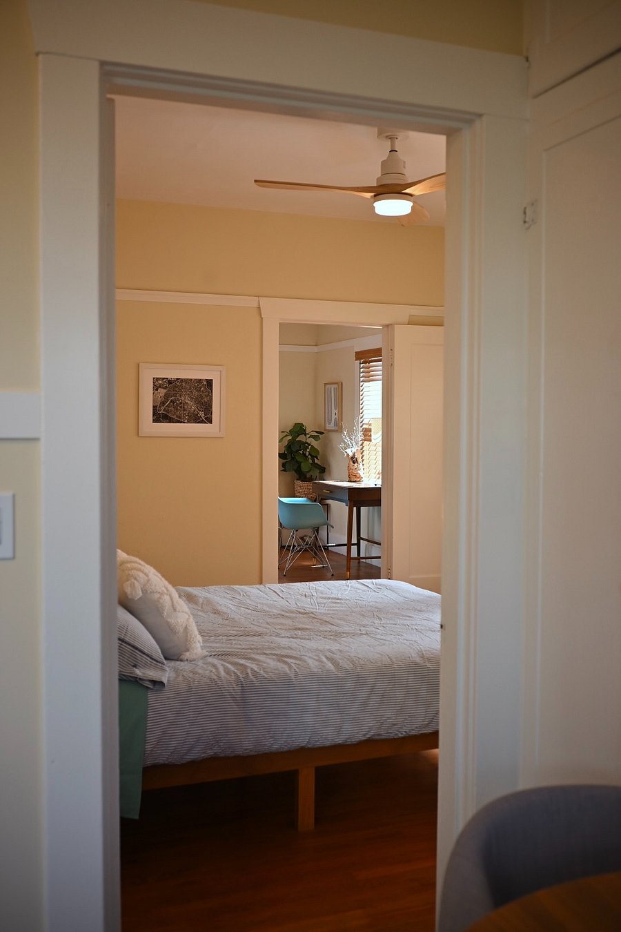 bedroom, LR in background