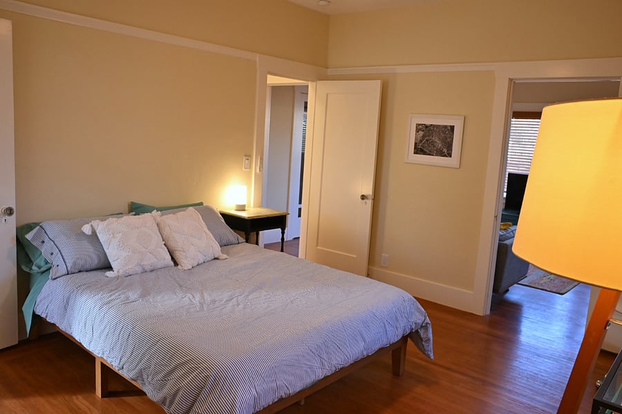 bedroom, LR in background
